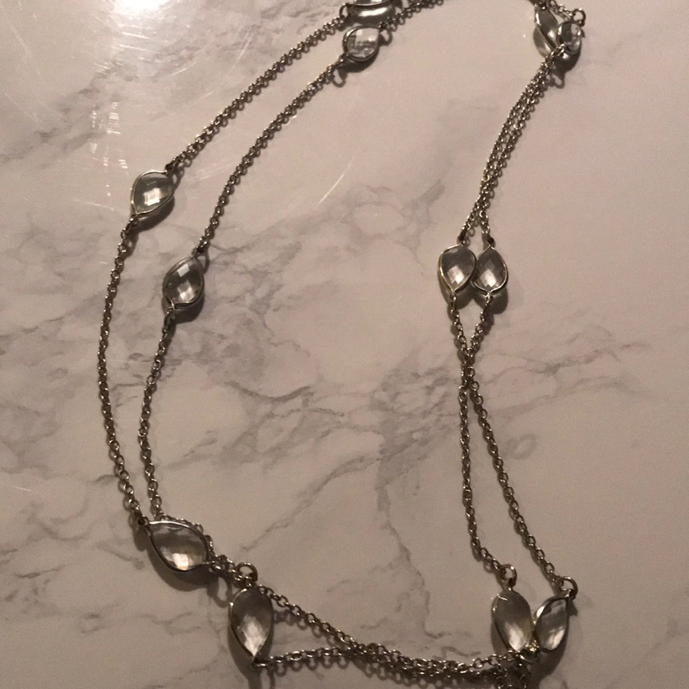 Long silver colour costume necklace
